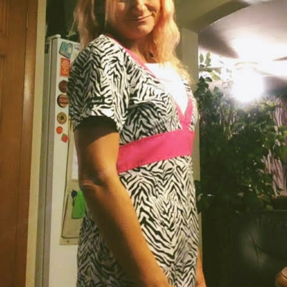 Zebra striped scrub top